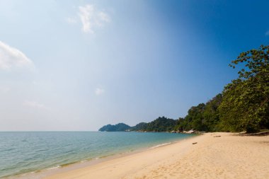 Pasir Bogak beach on Pangkor island in Malaysia. Beautiful seascape and harbor taken in south east Asia. clipart