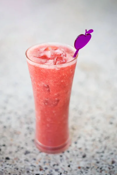 Fresh prepared watermelon shake with ice cubes in local restaurant in Cameron Highlands. Traditional malaysian cuisine made of fresh ingredients.