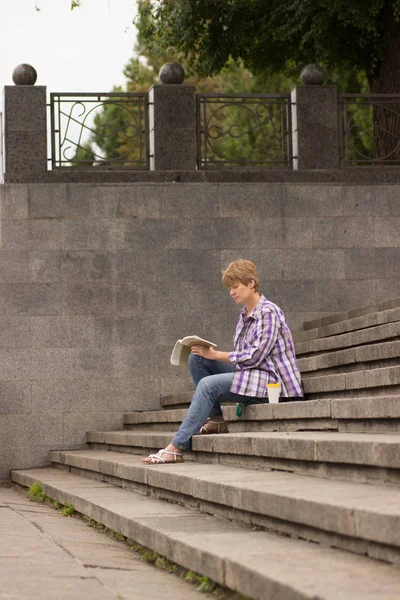 Positive Woman Sitting Reading Book Steps — Stock Photo, Image
