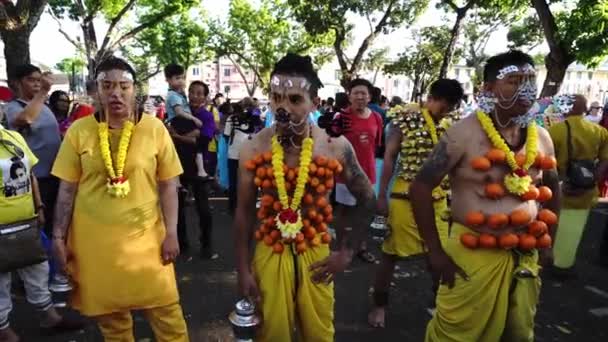 Chinese Kavadi bearer in journey go Waterfall Hilltop Temple. — Stock Video