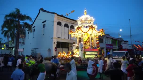 The holy cows pull the silver chariot during dawn hour. — Stock Video