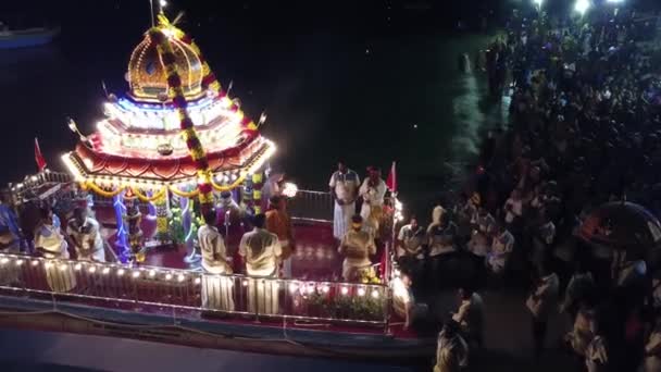 Beautifully lighted Chariot at beach during night. — Stock Video