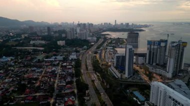 George Town, Penang, Malaysia - Aug 04 2024: Aerial view of George Town illuminated with dazzling city lights reflecting off the heritage rooftops.