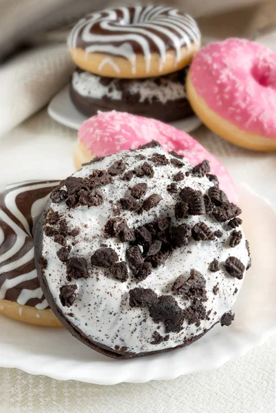 Sweet Donuts Chocolate Oreo White Sugared Icing — Stock Photo, Image