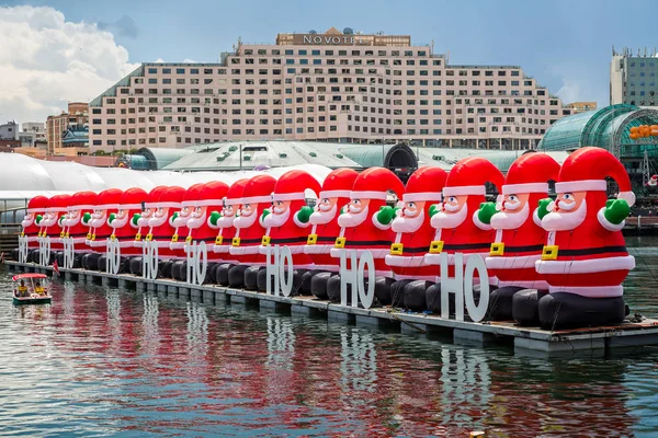 Dev şişme babası Chritsmas'ın kayan Darling Harbour, Sydney, Nsw, 7 Aralık 2014 alınan Australi içinde satır