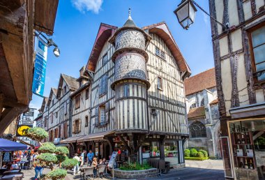 Turreted medieval bakers house in historic centre of Troyes with half timbered buildings in Troyes, Aube, France on 31 August 2018 clipart