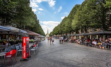 Street cafes around the Sube fountain in Place d'Erlon, Reims, Burgundy, France taken on 29 June 2018 clipart
