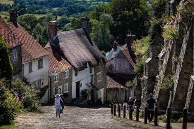 Looking down famous cobbled Gold Hill in Shaftesbury, Dorset, UK on 30 July 2020 clipart