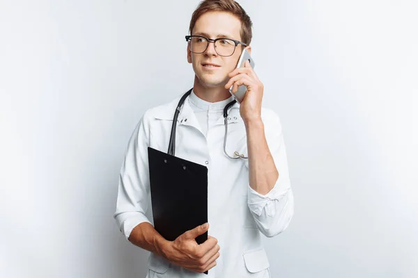 Young Handsome Doctor Talking Phone Patients Intern Student Folder Hand — Stock Photo, Image