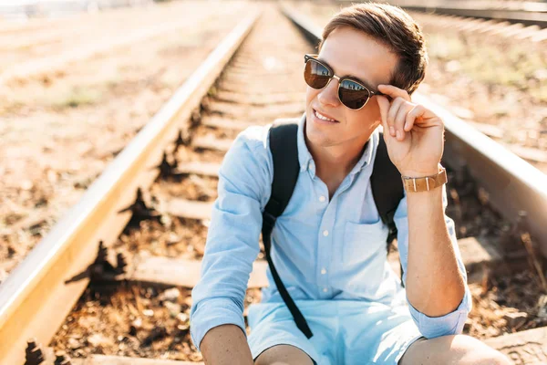 Beautiful Stylish Guy Glasses Posing Sitting Rails Train Sunset Hipster — Stock Photo, Image