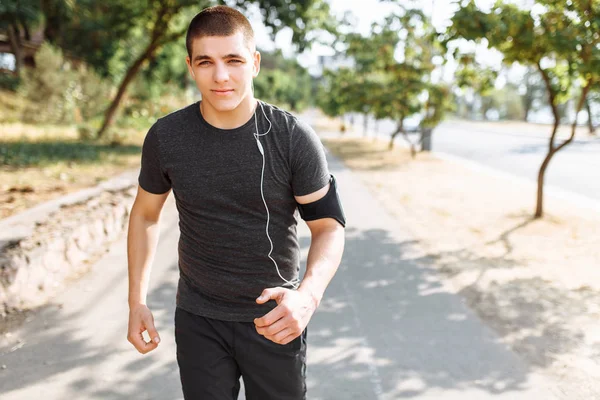 man makes a morning jog in the streets, sports training