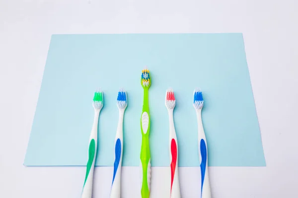 Toothbrushes Light Blue Background Close Different Kinds Toothbrushes New Used — Stock Photo, Image