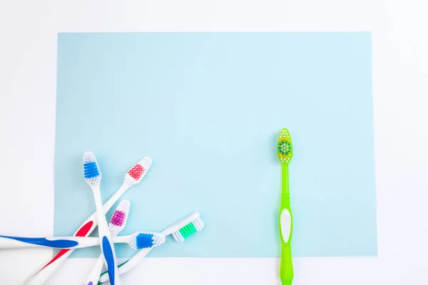 Toothbrushes Light Blue Background Close Different Kinds Toothbrushes New Used — Stock Photo, Image