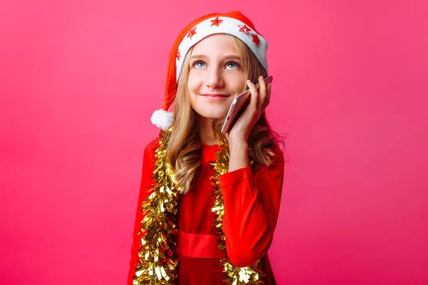 Happy Girl Santa Red Hat Tinsel Her Neck Teen Talking — Stock Photo, Image