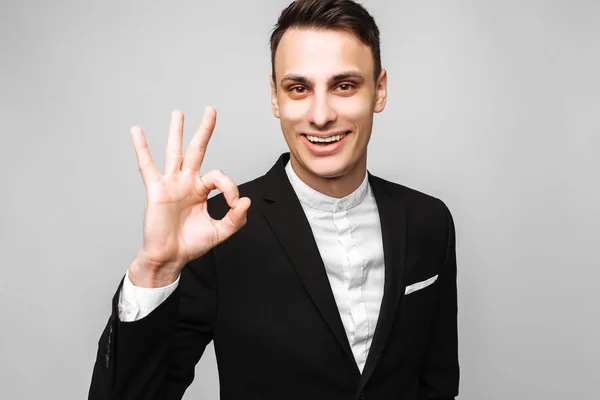 Portrait Young Handsome Happy Man Business Suit Smiling Showing Gesture — Stock Photo, Image