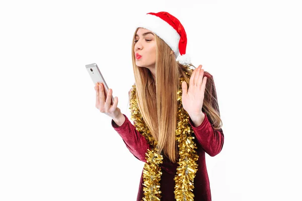 Beautiful Girl Hat Santa Claus Dress Smartphone His Hands Looking — Stock Photo, Image