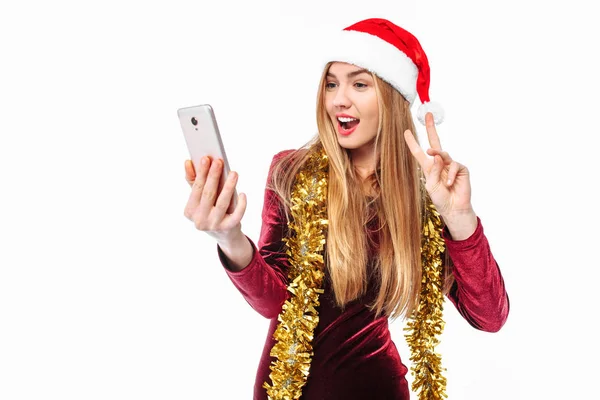 Beautiful Girl Hat Santa Claus Dress Smartphone His Hands Looking — Stock Photo, Image