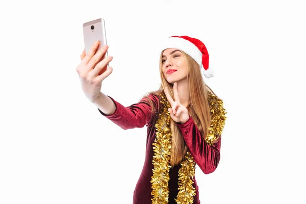 Happy Woman Santa Hat Dress Shoots Herself Smartphone White Background — Stock Photo, Image