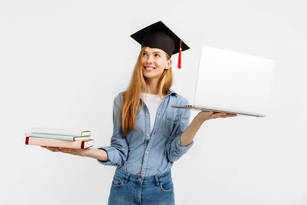 Thoughtful Focused Graduate Graduation Cap Her Head Laptop Books Her — Stock Photo, Image