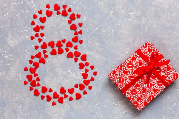 Red Hearts Figurines Form Eight Gift Box Red Ribbon Light — Stock Photo, Image