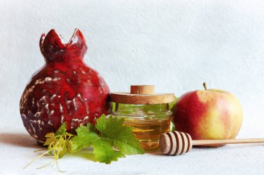 Apples and honey. Concept for Rosh Hashanah the Jewish New Year. Top view, close up on white background. clipart