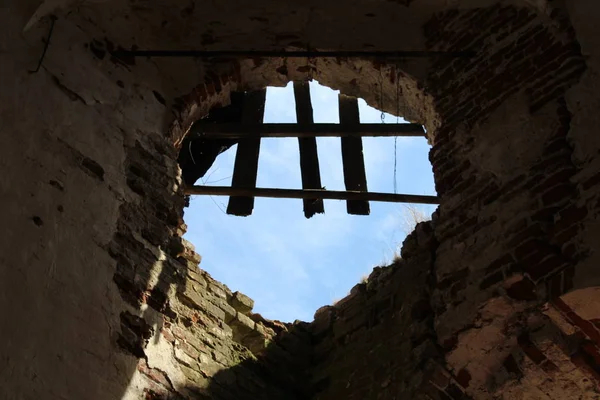 walls and Windows in the ruins of an ancient Church in Russia / photo of an ancient Church.of the temple there were walls.they were built of brick and whitewashed.the building has preserved Windows.the hole in the form of an arch.