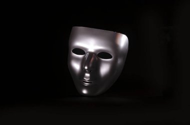 a shiny metallic mask highlighted against a start black background clipart