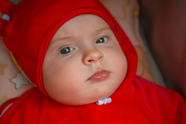 the child is in a wheelchair, a six-month-old girl