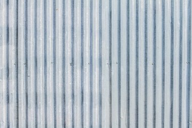 Metal çit. Galvanizli, oluklu doku