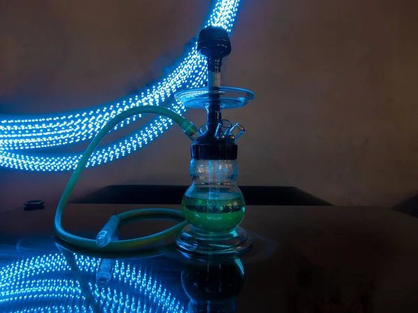 Beautiful glass hookah on the table in the bar. — Stock Photo, Image