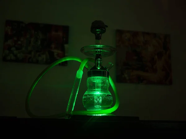 Beautiful glass hookah on the table in the bar. — Stock Photo, Image