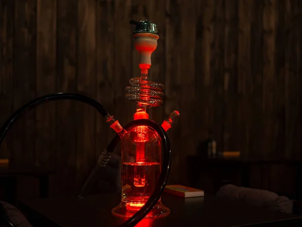 Beautiful glass hookah on the table in the bar. — Stock Photo, Image