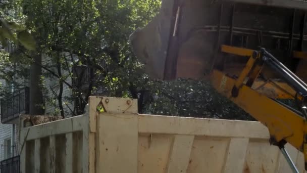 Tractor Removes Construction Debris Courtyard Residential Building Laying New Asphalt — Stock Video