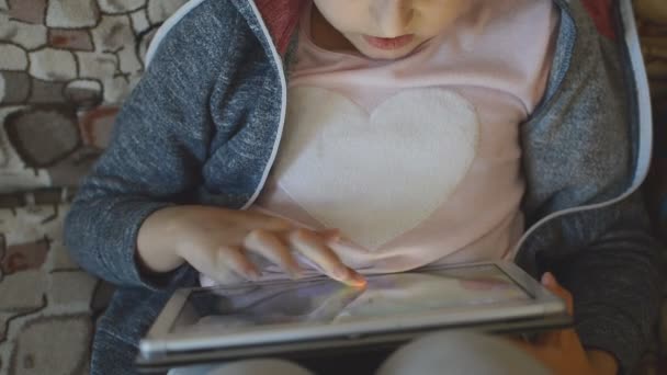 Girl Playing Game Tablet Close Screen Lying Couch — Stock Video