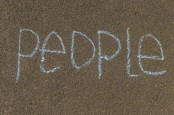 chalk lettering, people, the inscription on the pavement in large letters