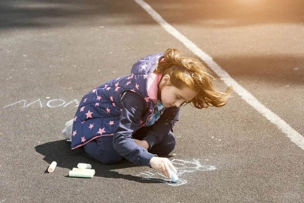 Child Paints Chalk Asphalt Little Girl Windy Weather Writes Different — Stock Photo, Image