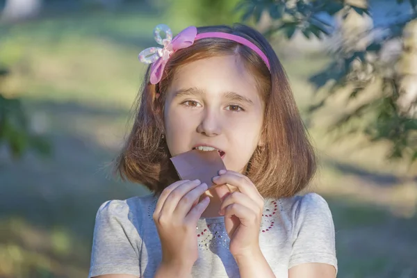 Little Girl Child Eating Two Hands Delicious Chocolate Nature — Stock Photo, Image
