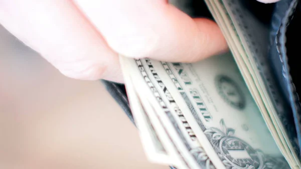 Businessman hands counting dollar bills in wallet. — Stock Photo, Image