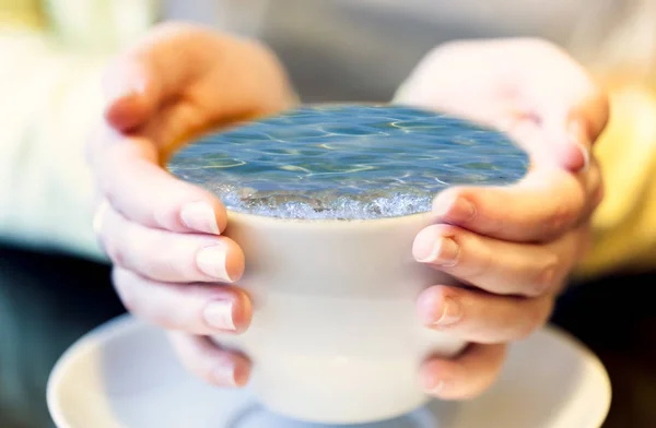 Sea surf in a cup of coffee — Stock Photo, Image