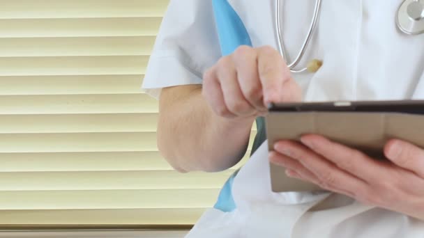 Medical Doctor Using Modern Touchscreen Digital Tablet Close — Stock Video