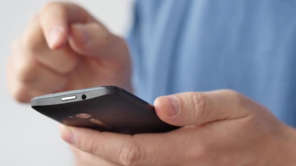 Close-up of hands holding smartphone — Stock Video