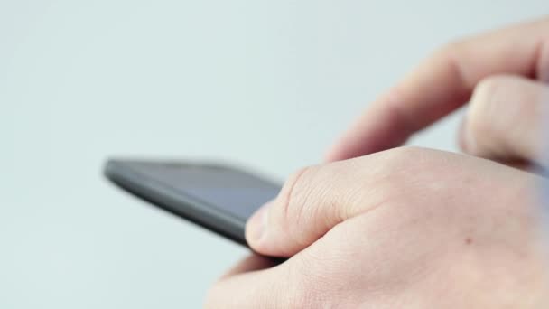 Close-up of hands holding smartphone — Stock Video