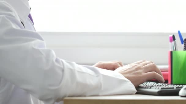 Medical Doctor Working Laptop His Cabinet Clicking Computer Mouse — Stock Video