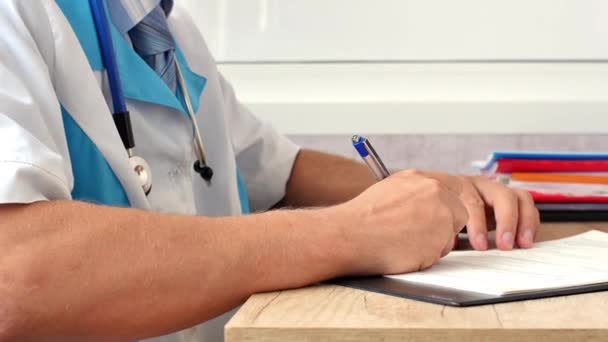 Medical professional doctor writing RX prescription on clipboard. — Stock Video