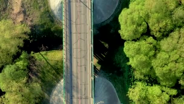 Arial view of white car moving on rural road. — Stock Video