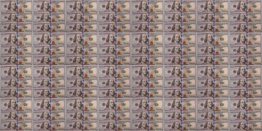 İçinde yeni ve katlanmış Amerikan dolarları olan bir fotoğraf.