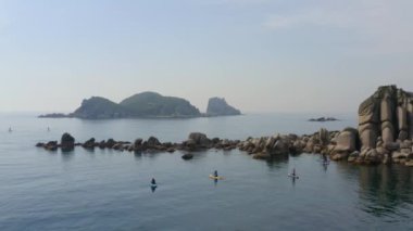 Deniz koyunda Sup-serfers, Rusya