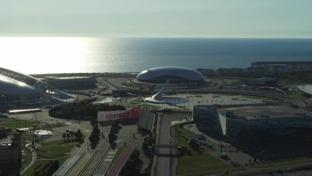 Сочи, Россия - октябрь 2019 года: Сочинский олимпийский парк вечером, с высоты — стоковое видео