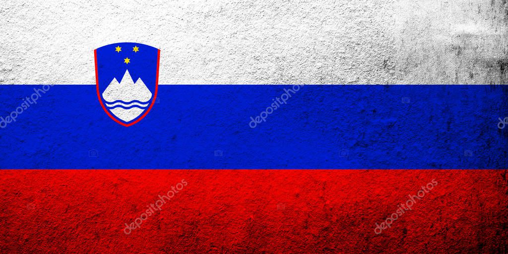 The Republic of Slovenia National flag. Grunge background