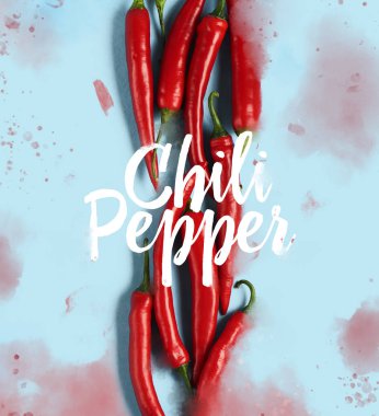 Mavi arka plan düz yatıyordu kırmızı biber desen. Üstten Görünüm